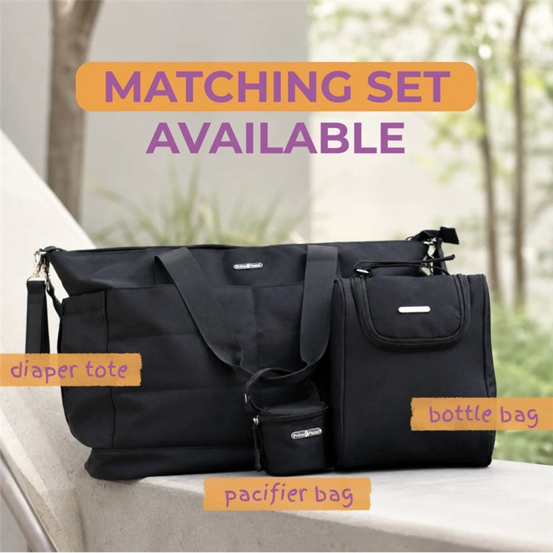 Pink Primo Passi pacifier bag displayed alongside a diaper tote and bottle bag, highlighting a matching set available.