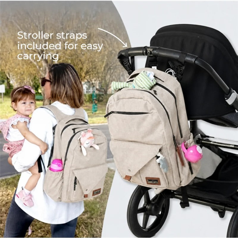 Beige Primo Passi PerTutti Baby Diaper Bag Backpack featuring stroller straps, carried by a woman with a child.