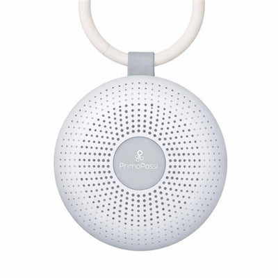 Portable white noise machine by Primo Passi, featuring a round design, speaker holes, and a hanging loop for easy attachment.