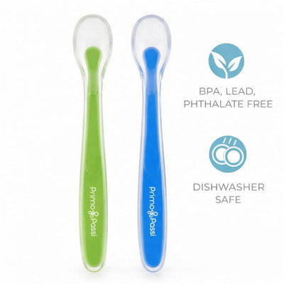 Four silicone spoons by Primo Passi in blue and green, BPA-free and dishwasher safe, designed for child feeding.