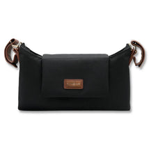 Primo Passi Nero Stroller Organizer, black with a front flap and brown leather accents, serves as a 2-in-1 organizer and shoulder bag.