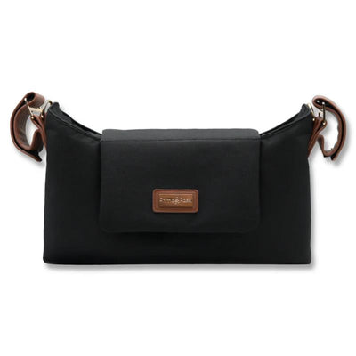 Primo Passi Nero Stroller Organizer, black with a front flap and brown leather accents, serves as a 2-in-1 organizer and shoulder bag.