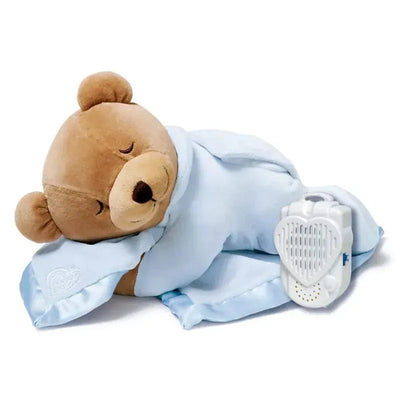 Blue slumber bear with a soft blanket, featuring a small sound machine for soothing sleep.