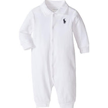 White cotton polo coverall for babies featuring a collar and a small navy blue polo logo.