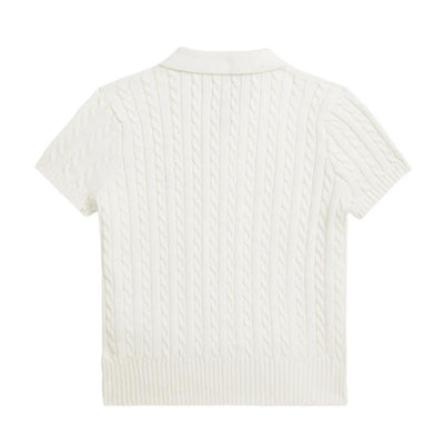 Short-sleeve white baby polo shirt featuring a mini cable knit design and ribbed collar and hem.