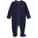 Ralph Lauren baby boy coverall in French navy with long sleeves, front zipper, and white stitching detail.