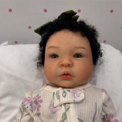 Reborn Baby Doll - White Vinyl & Black Curly Wig, Shyann Image 1