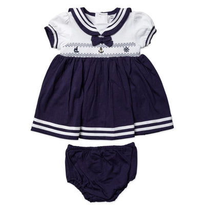 Navy nautical dress set for baby girls featuring a white top with a sailor collar and matching bloomers.