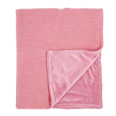 Soft pink knit blanket with a plush underside, ideal for keeping babies warm and cozy.