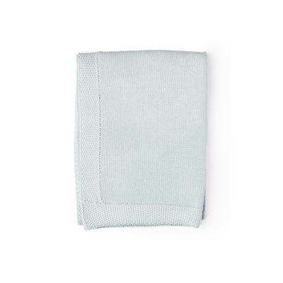 Knit blanket in light blue with a textured border, designed for warmth and style.