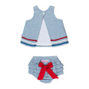 Blue seersucker swing top with red and white ric rac trim paired with ruffled bloomers featuring a red bow.