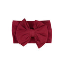 Dark cherry headband featuring a large bow at the front, designed for girls.