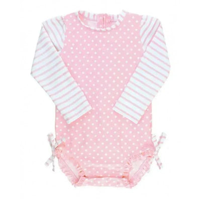 Pink polka dot one-piece rash guard with long striped sleeves and side ties, designed for infants 6 to 12 months.