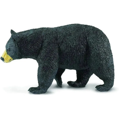 Black bear figurine from Safari Ltd, featuring realistic textures and a dynamic stance, emphasizing its black fur and yellow muzzle.