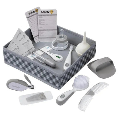Deluxe nursery kit featuring various baby care items in a grey and white storage container.