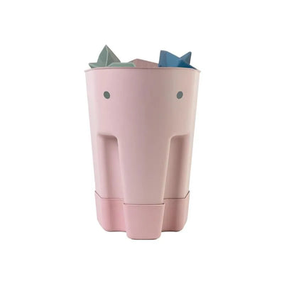 Blush pink bath toy storage scoop shaped like an elephant, with soft rounded edges and playful ear details, holding several toys.