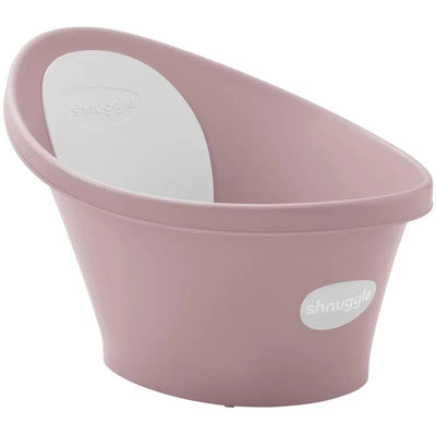 Newborn baby bath in blossom pink, featuring a white backrest and the Shnuggle logo, designed for safe bathing.