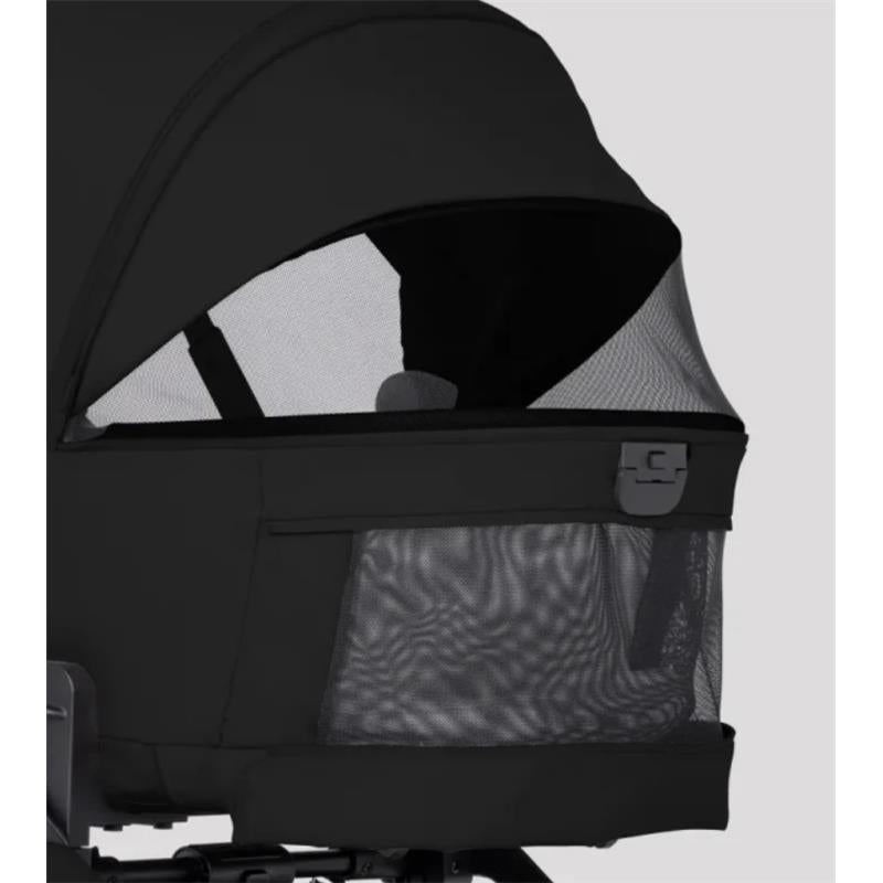 Compact stroller bassinet in Onyx color featuring a mesh panel for ventilation and a secure zip closure.