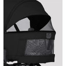 Compact stroller bassinet in Onyx color featuring a mesh panel for ventilation and a secure zip closure.
