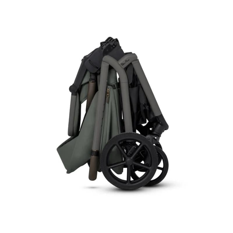 Compact Silver Cross Breez stroller and folding bassinet bundle in pewter color, neatly folded for storage.