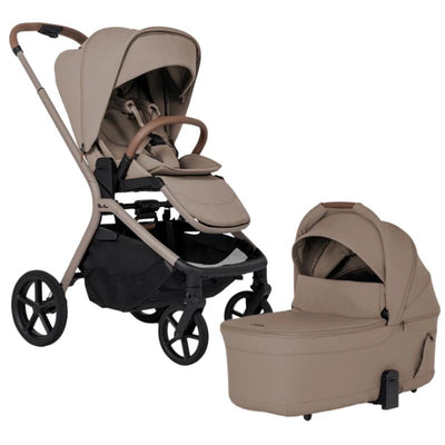 Silver Cross Breez Modular Stroller in Champagne with a removable bassinet; features a sleek design and plush seating.