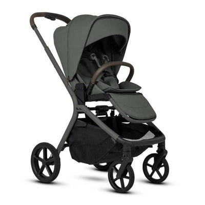 Silver Cross Breez modular stroller in pewter with a rounded handlebar and large wheels, designed for versatility and comfort.