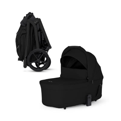 Folding bassinet in black, featuring a zippered cover and a compact, easy-to-store design with wheels.