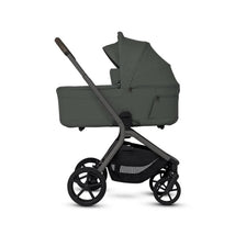 Silver Cross Breez Overnight Approved Folding Bassinet in pewter, with a grey fabric body and a folding design.