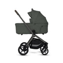 Silver Cross Breez Overnight Approved Folding Bassinet in pewter, with a grey fabric body and a folding design.