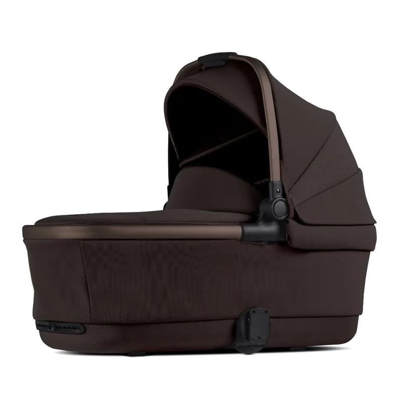 Silver Cross Reef 2 Folding Bassinet in Ganache, featuring a dark brown fabric with a sunshade hood and sleek design.