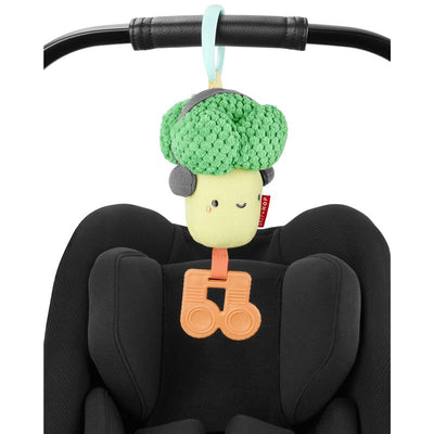 Soft broccoli-shaped stroller toy with teethers and an attachment clip, designed for baby play and sensory engagement.