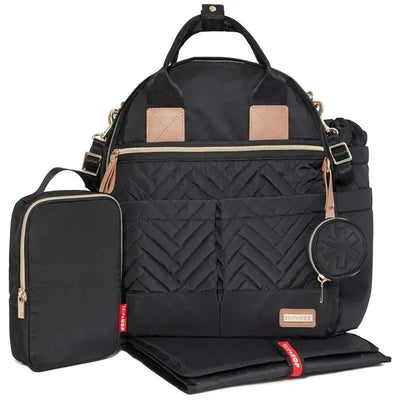 Skip Hop Suite Diaper Bag Backpack Set in black features a quilted design, gold zippers, and includes a changing pad and small accessory pouch.