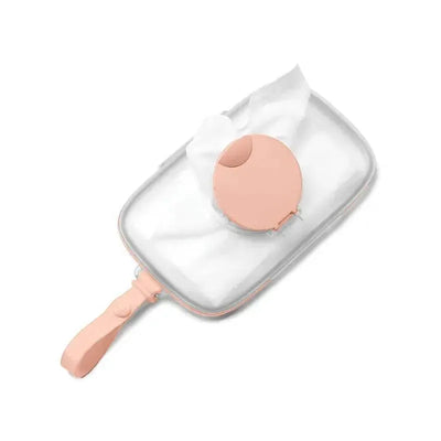 Blush Skip Hop Grab & Go Snug Seal Wipes Case with a pink circular latch and wipes partially visible.