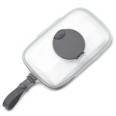 Gray Skip Hop Grab & Go Snug Seal Wipes Case with a circular closure and handle strap for easy portability.