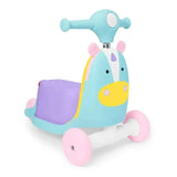 Colorful Skip Hop Zoo 3-In-1 Ride-On Toy shaped like a unicorn, featuring a playful design and sturdy wheels for support.