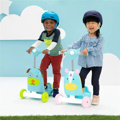 Two children happily ride colorful 3-in-1 ride-on toys shaped like a dog and a unicorn, set against a light blue background.