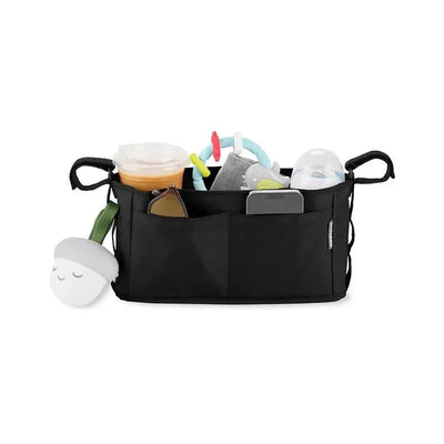 Universal Stroller Organizer in black, featuring compartments filled with a drink, baby bottles, sunglasses, and toys.