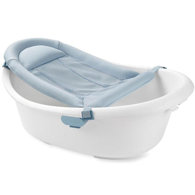 4-In-1 baby bath tub in white with a blue mesh sling for safety and support during bath time.