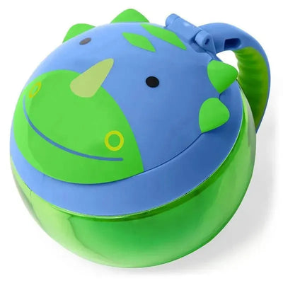 Dino-shaped snack cup featuring a blue lid with a smiling face and a green base, ideal for children.