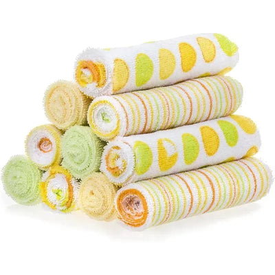 Soft terry bath washcloths in yellow and green dots, stacked in a decorative arrangement.