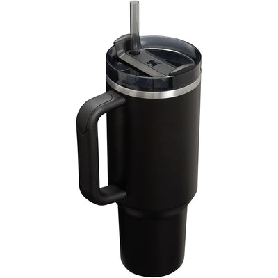 Stanley The Quencher H2.0 FlowState™ Tumbler in black, featuring a wide handle, a clear lid with a straw, and a 40 oz capacity.