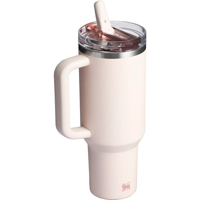 Stanley The Quencher ProTour Flip Straw Tumbler 40 oz in rose quartz color, featuring a large handle and flip straw lid.
