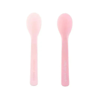 100% silicone baby spoons in pale pink and deeper pink, ideal for feeding infants.