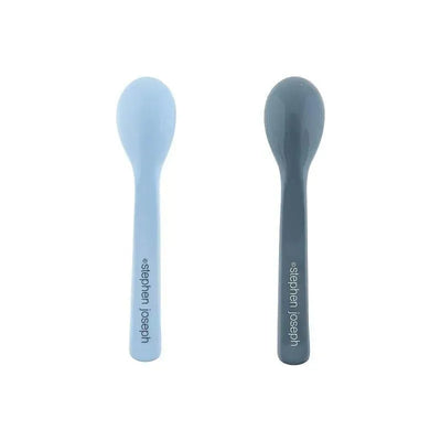 Two silicone baby spoons by Stephen Joseph, one blue and one gray, designed for young children.