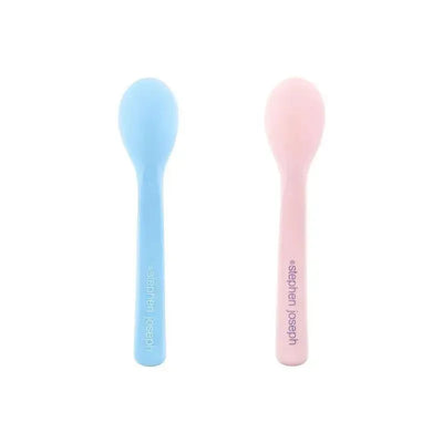 Set of two Stephen Joseph silicone baby spoons in blue and pink, designed for easy feeding.