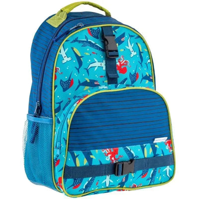 Blue shark-themed backpack featuring colorful marine life patterns, adjustable straps, and a front zip pocket.