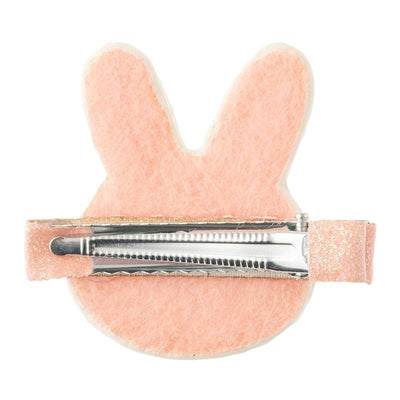 Pink bunny-shaped hair clip with a metallic clip backing, made from soft felt material.
