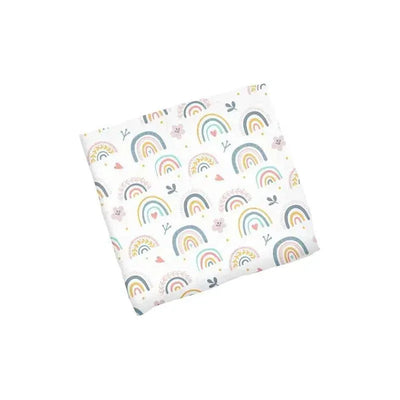 Rainbow muslin blanket featuring colorful rainbows, flowers, and hearts on a white background.