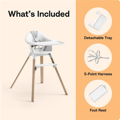 Stokke Clikk™ High Chair in Midnight Black features a detachable tray, a 5-point harness, and a footrest shown on a light background.