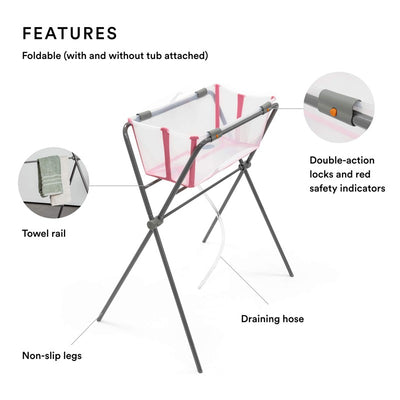 Grey Stokke Flexi Bath Stand featuring a foldable design, towel rail, non-slip legs, and a draining hose.